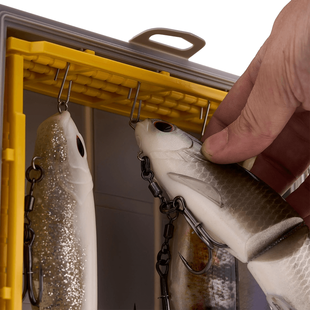 PLANO EDGE SWIMBAIT BOX 3700™ with someone removing a bait