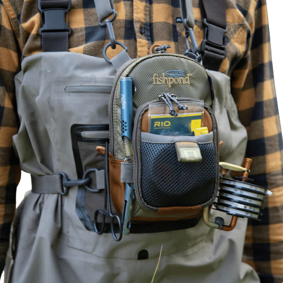 FISHPOND SAN JUAN VERTICAL CHEST PACK - SADDLE BROWN_FRONT ANGLE MODEL