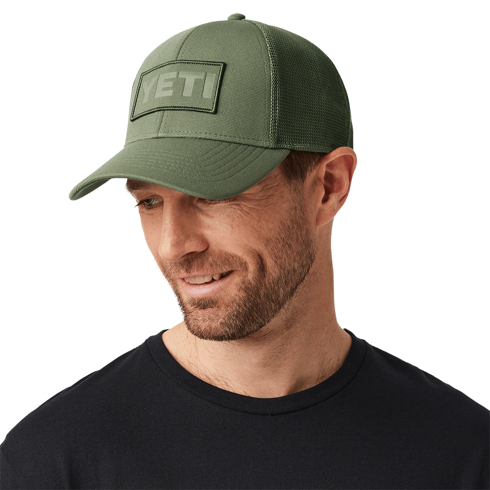 PATCH TRUCKER HAT - Olive, on man smiling