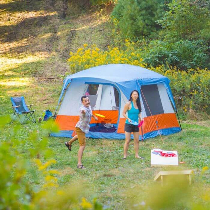 Coper canyon tent set up with people enjoying it