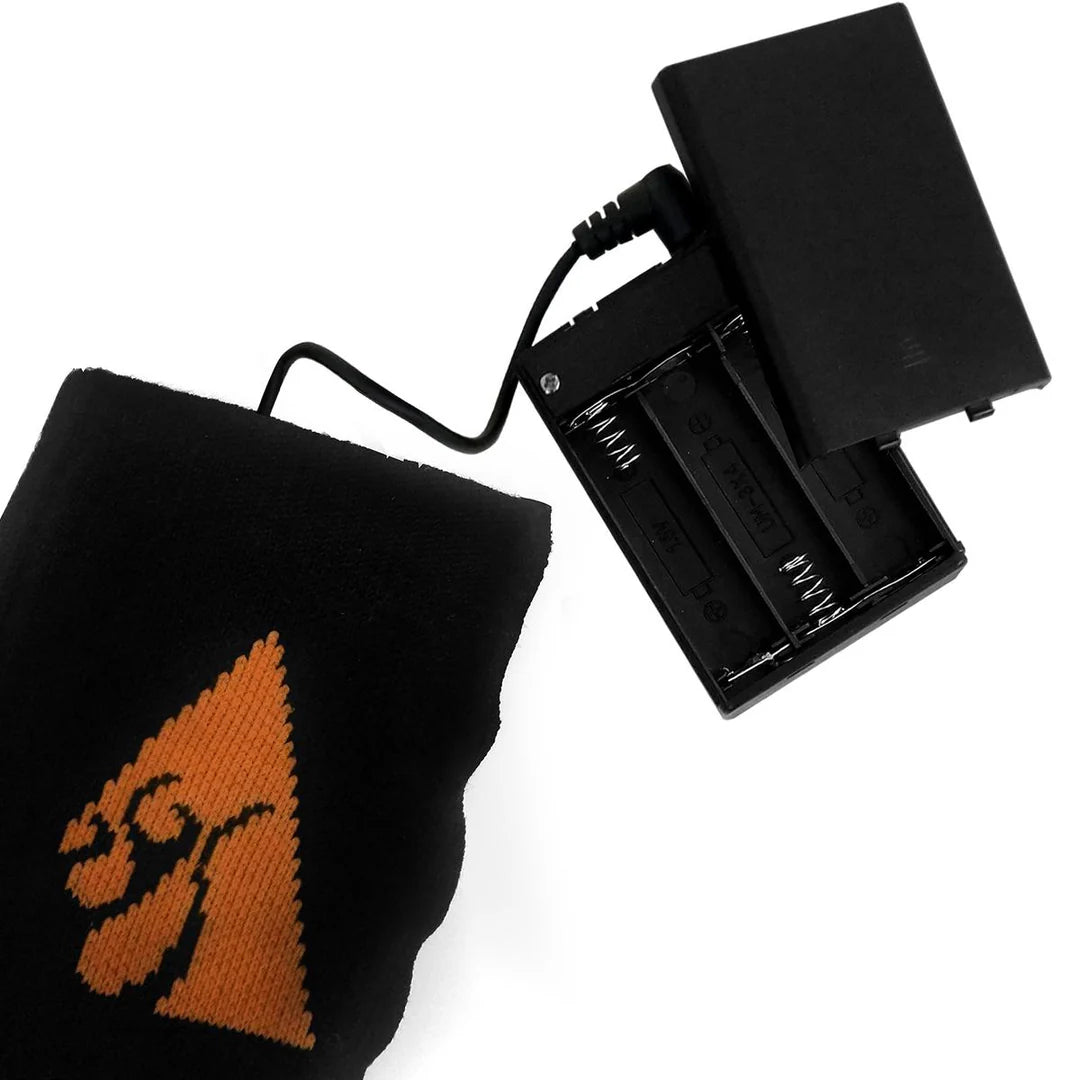 ACTIONHEAT HEATED WOOL SOCKS AA BATTERY - REPLACEMENT SOCKS ONLY showing battery packs up close