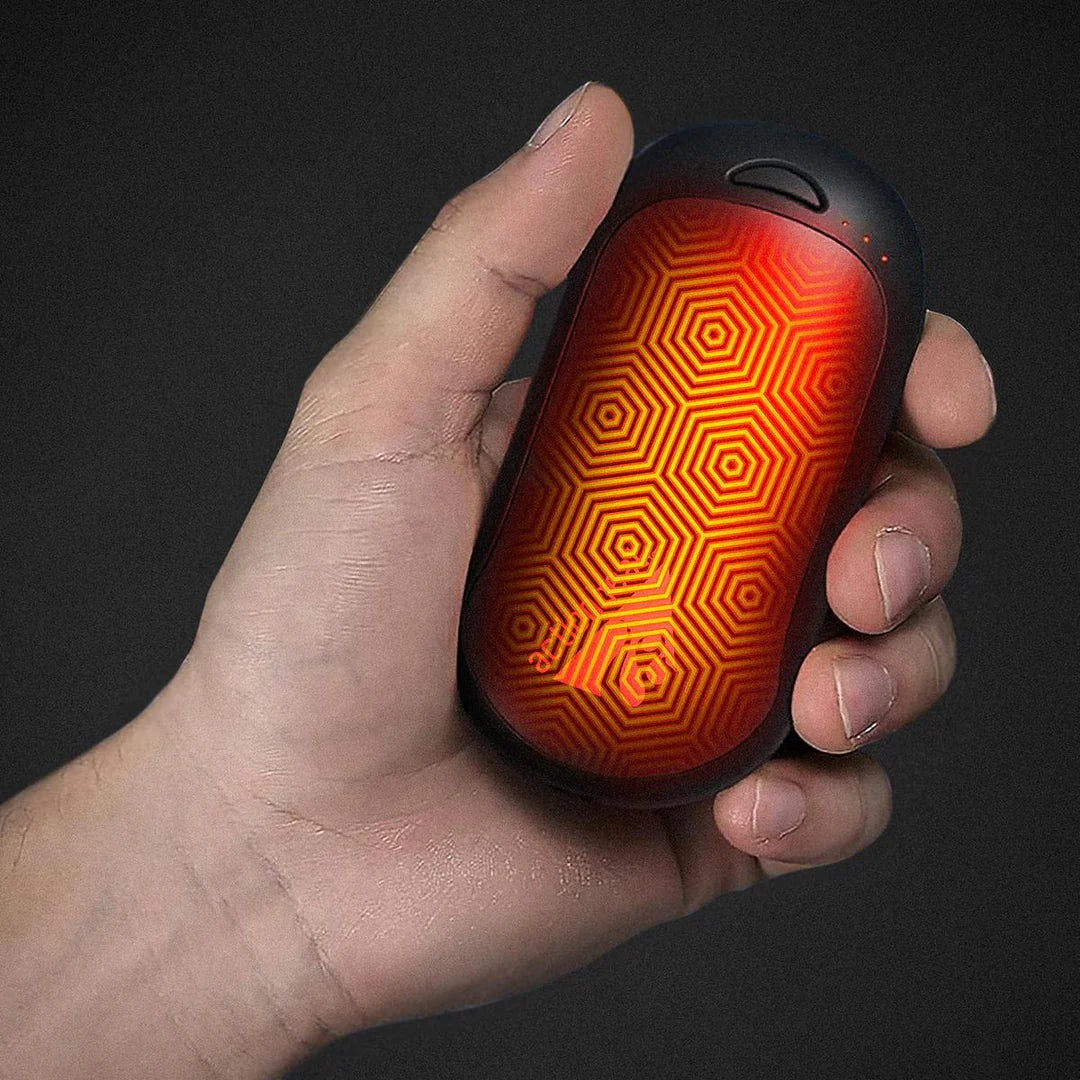 ACTIONHEAT 5V ELECTRIC HAND WARMER in someone's hand