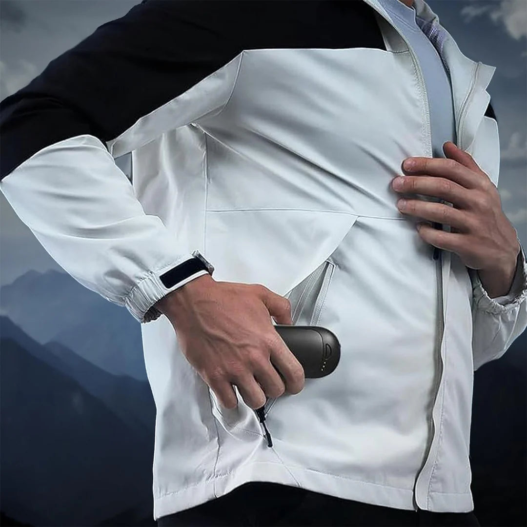 ACTIONHEAT 5V ELECTRIC HAND WARMER showing someone putting it in their pocket