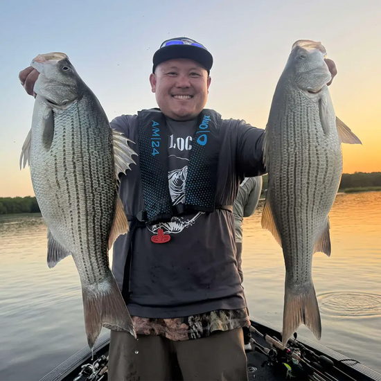 Ali V. showing his white bass catch that he caught in Iowa.