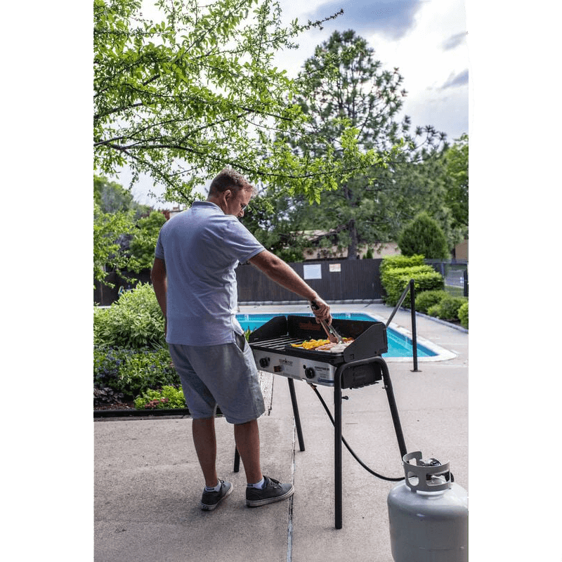 CAMPCHEF EXPEDITION DOUBLE BURNER STOVE with guy cooking