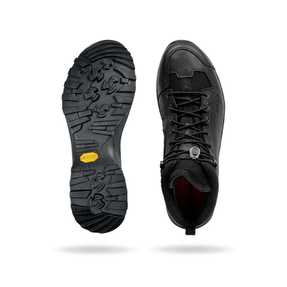 Black Crispi AT4 hiking boot with rugged outsole, leather upper, reinforced toe, and secure lace system. Designed for durability and all-terrain performance.