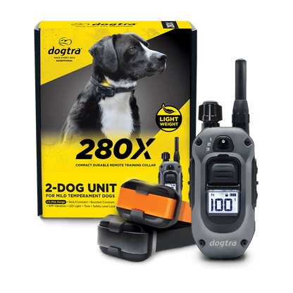 Dogtra 280X 2-Dog Unit Compact Remote Training Collar packaging and components. The image shows a yellow and black product box featuring a dog, along with the remote transmitter and two lightweight training collars—one with an orange strap and one with a black strap. The system is designed for mild temperament dogs and highlights features like 1/2-mile range, LED light, tone, vibration, and safety level lock.
