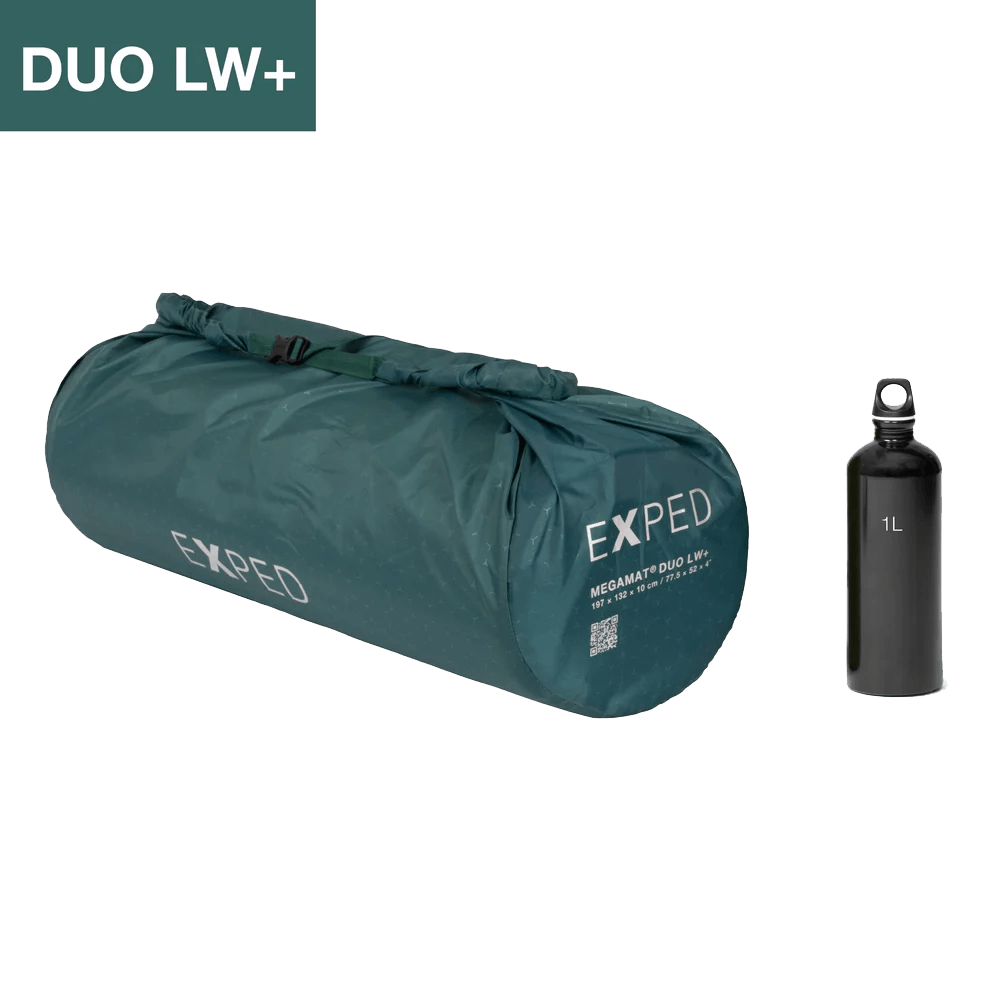 EXPED MEGAMAT DUO SLEEPING PAD - LW+  CYPRESS rolled up with a 1 L water bottle for reference.