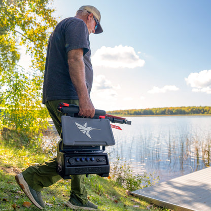 Fish Armor Pro Ultra Lite Shuttle with a man walking and holding the shuttle