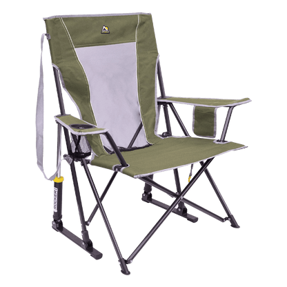 GCI Outdoor Comfort Pro Rocker folding camp chair in loden, featuring a mesh back panel, padded armrests, a drink holder, and shock-absorbing rocker legs designed for outdoor use.