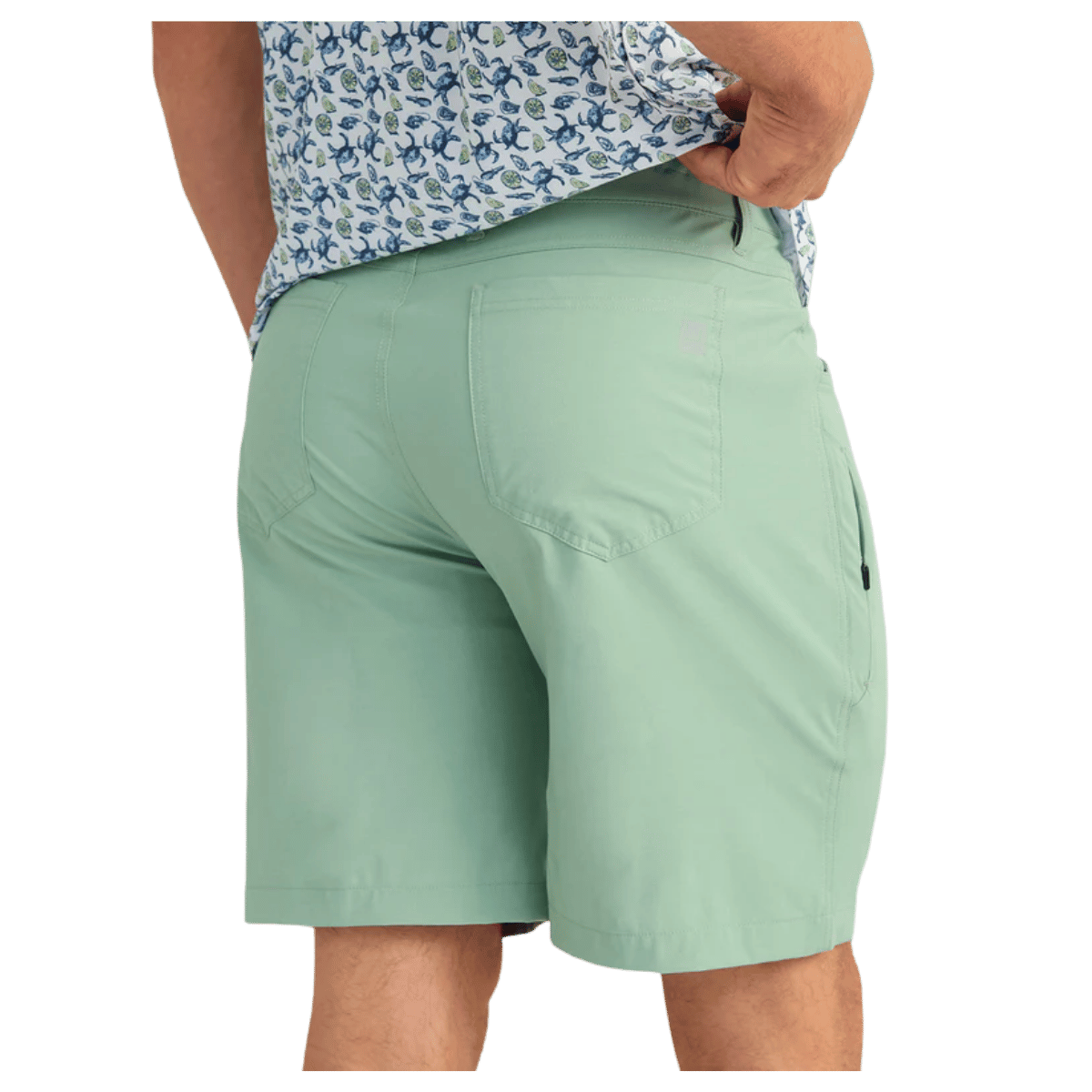 HUK MEN'S KONA 9-INCH SHORTS - FOG GREEN - BACK VIEW