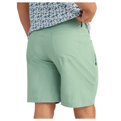 HUK MEN'S KONA 9-INCH SHORTS - FOG GREEN - BACK VIEW