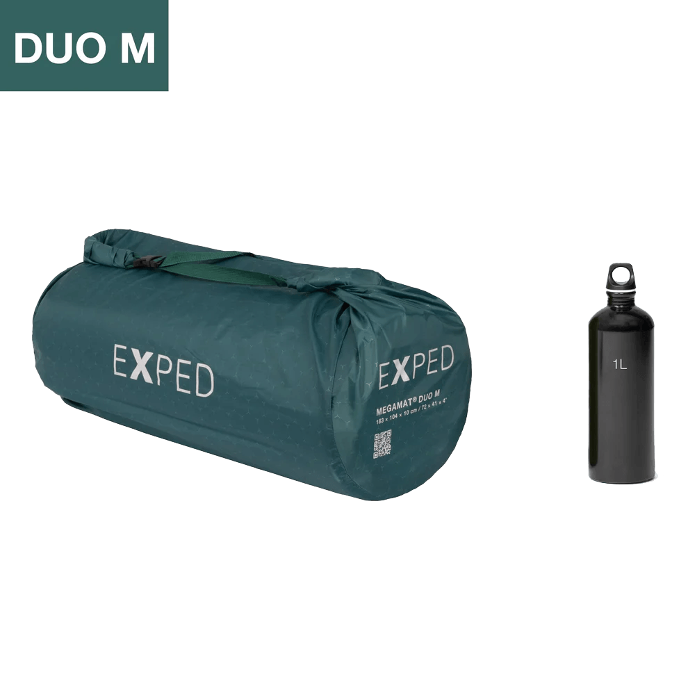 EXPED MEGAMAT DUO SLEEPING PAD - MEDIUM - CYPRESS packed up with a 1 L water bottle for reference