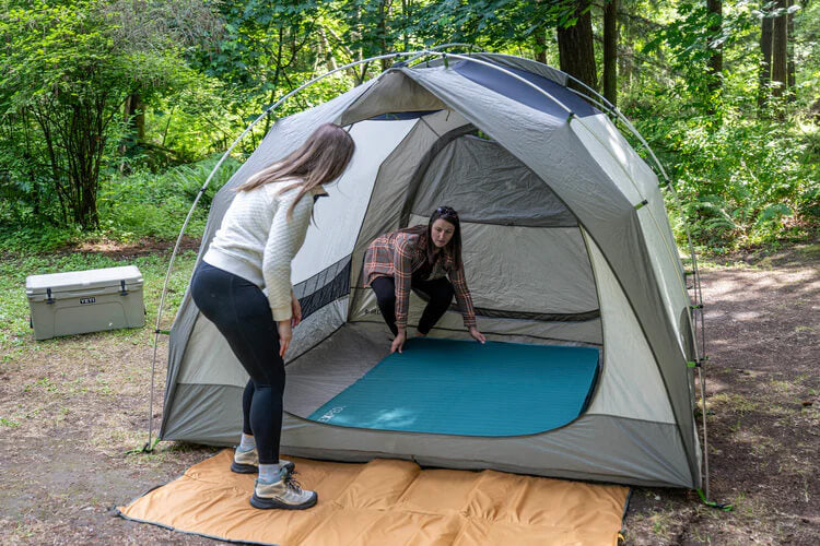 EXPED MEGAMAT DUO SLEEPING PAD - LW+  CYPRESS being used in a tent