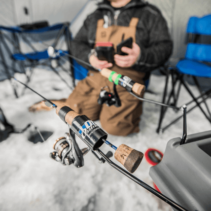 OTTER OUTDOORS SIDEKICK holding fishing rods