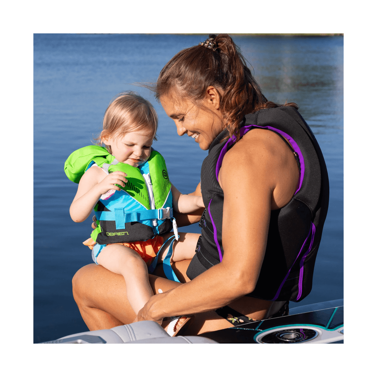 O'BRIEN INFANT NYLON LIFE JACKET - GREEN - ON WATER VIEW