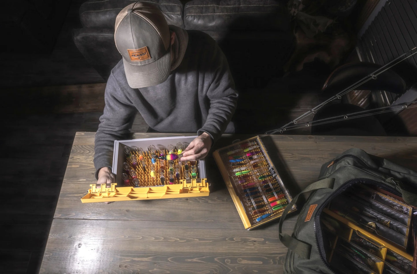 PLANO EDGE® MASTER CRANKBAIT XL TACKLE BOX with someone removing a bait
