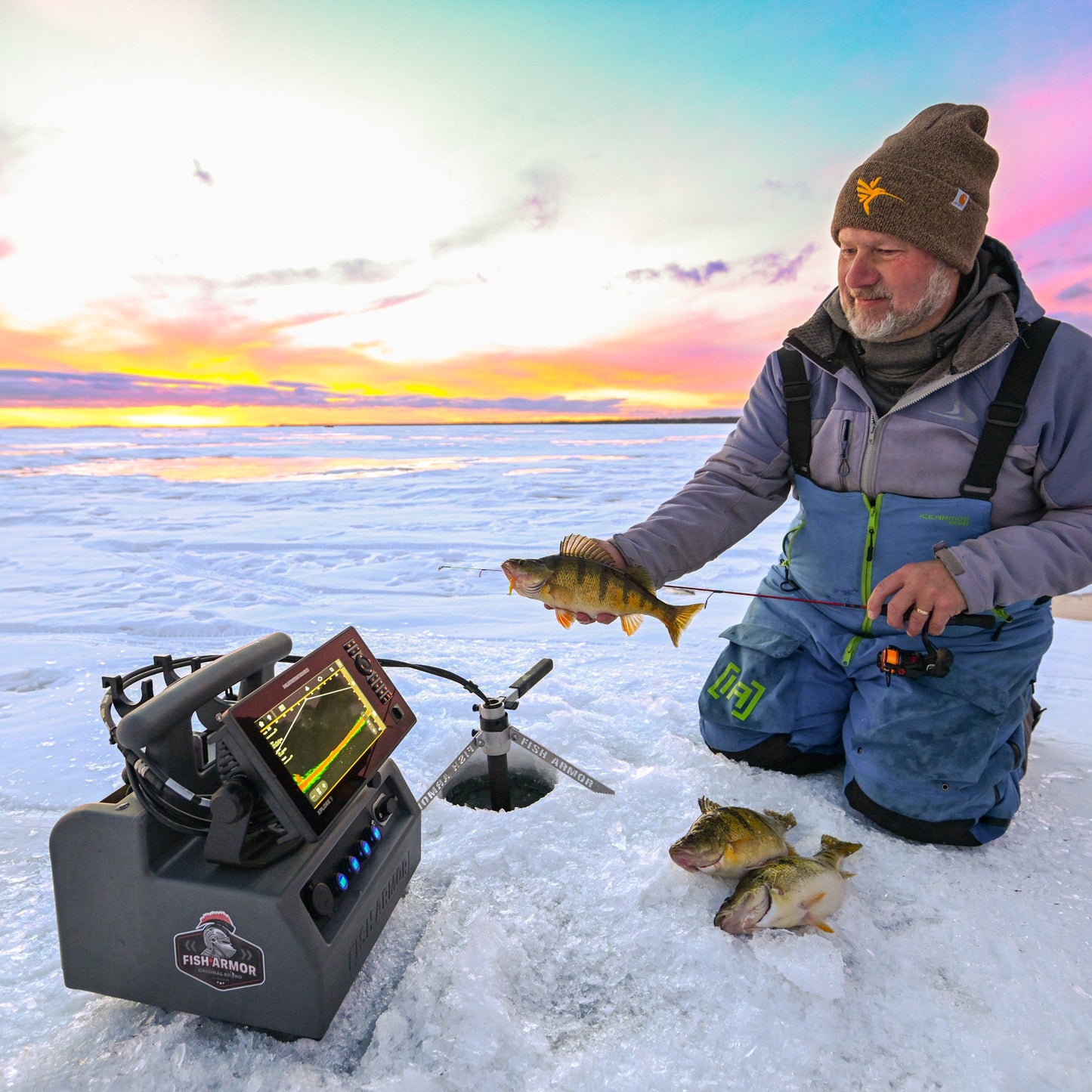 Fish Armor Pro Lite Shuttle someone using it for ice fishing and holding up a big perch 