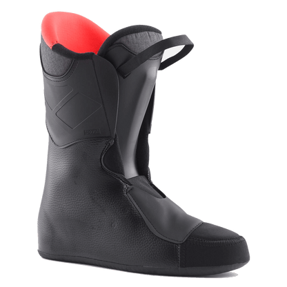 Black ski boot with red interior on a white background
