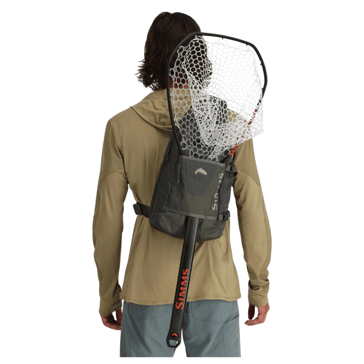 SIMMS TRIBUTARY FISHING SLING PACK - BASALT - BACK VIEW W/ FISHING ACCESSORIES