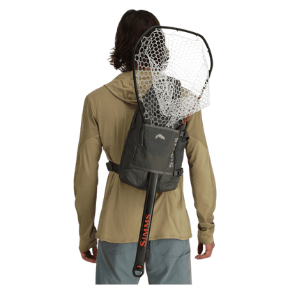 SIMMS TRIBUTARY FISHING SLING PACK - BASALT - BACK VIEW W/ FISHING ACCESSORIES
