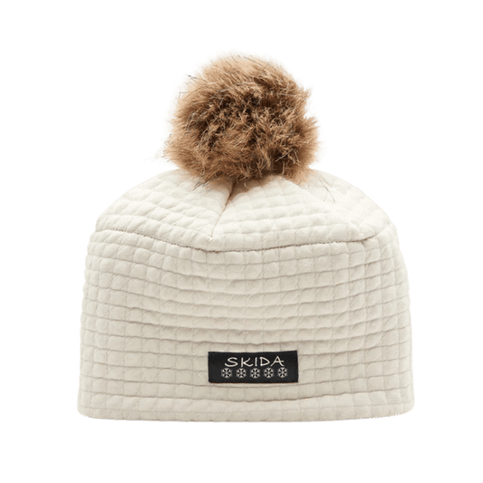 SKIDA CHATEAU FLEECE LINED POM HAT - ECRU