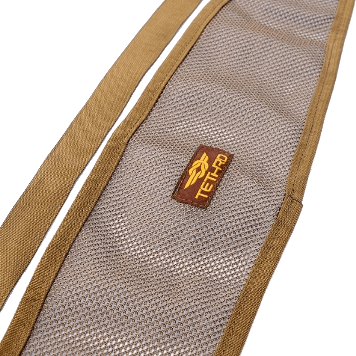 Close-up of tethrd modular versatile panel (MVP) in tan mesh design with adjustable strap and buckle, designed for added back support in saddle hunting setups.