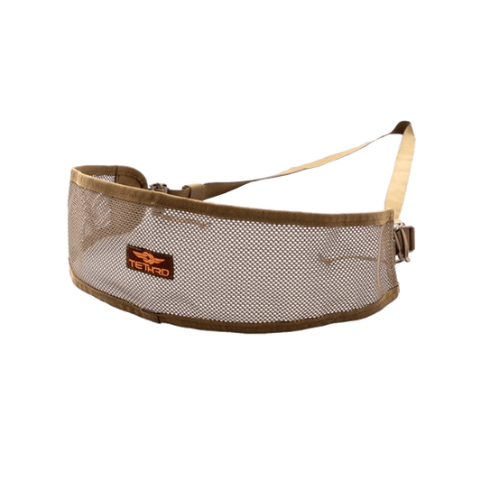 Tethrd Modular Versatile Panel (MVP) in tan mesh design with adjustable strap and buckle, designed for added back support in saddle hunting setups.