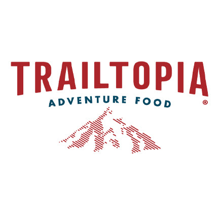 Trailtopia Adventure Food logo with red and blue text on a white background