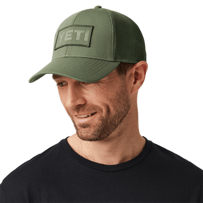 PATCH TRUCKER HAT - Olive, on man smiling