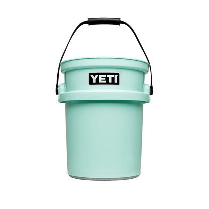 Seafoam green YETI bucket with black handle.