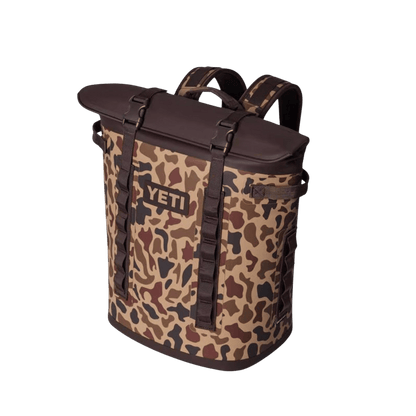 YETI PREMIUM HOPPER BACKPACK M20 - WETLANDS CAMO_1 - SIDE FRONT VIEW