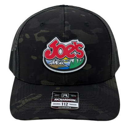 Black camouflage trucker hat with Joe's logo.