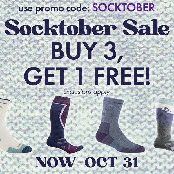 Socktober sale advertisement with socks on a textured background